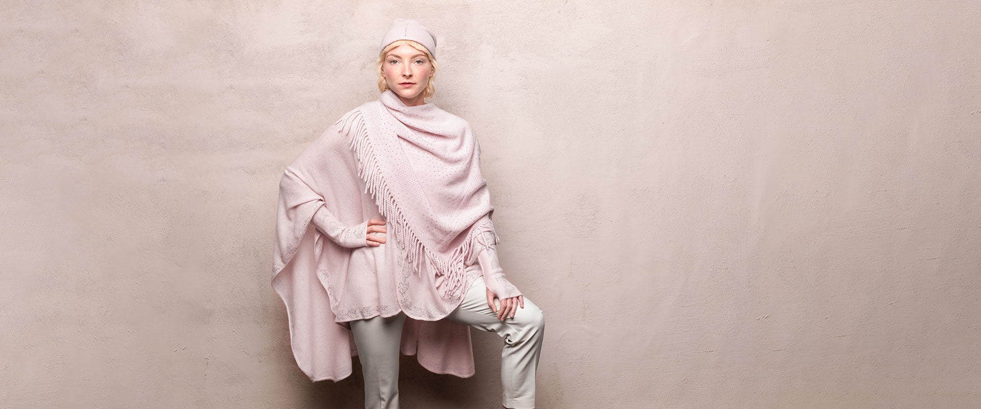 Model wearing luxury handmade cashmere clothing and accessories by Elyse Allen Textiles.