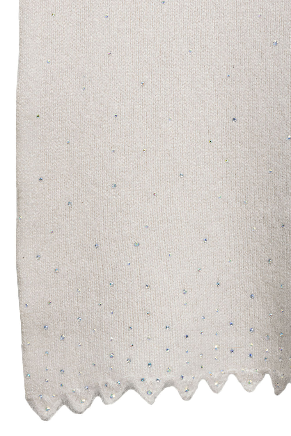 Close-up of a textured cashmere fabric with a subtle pattern of crystal embellishments.