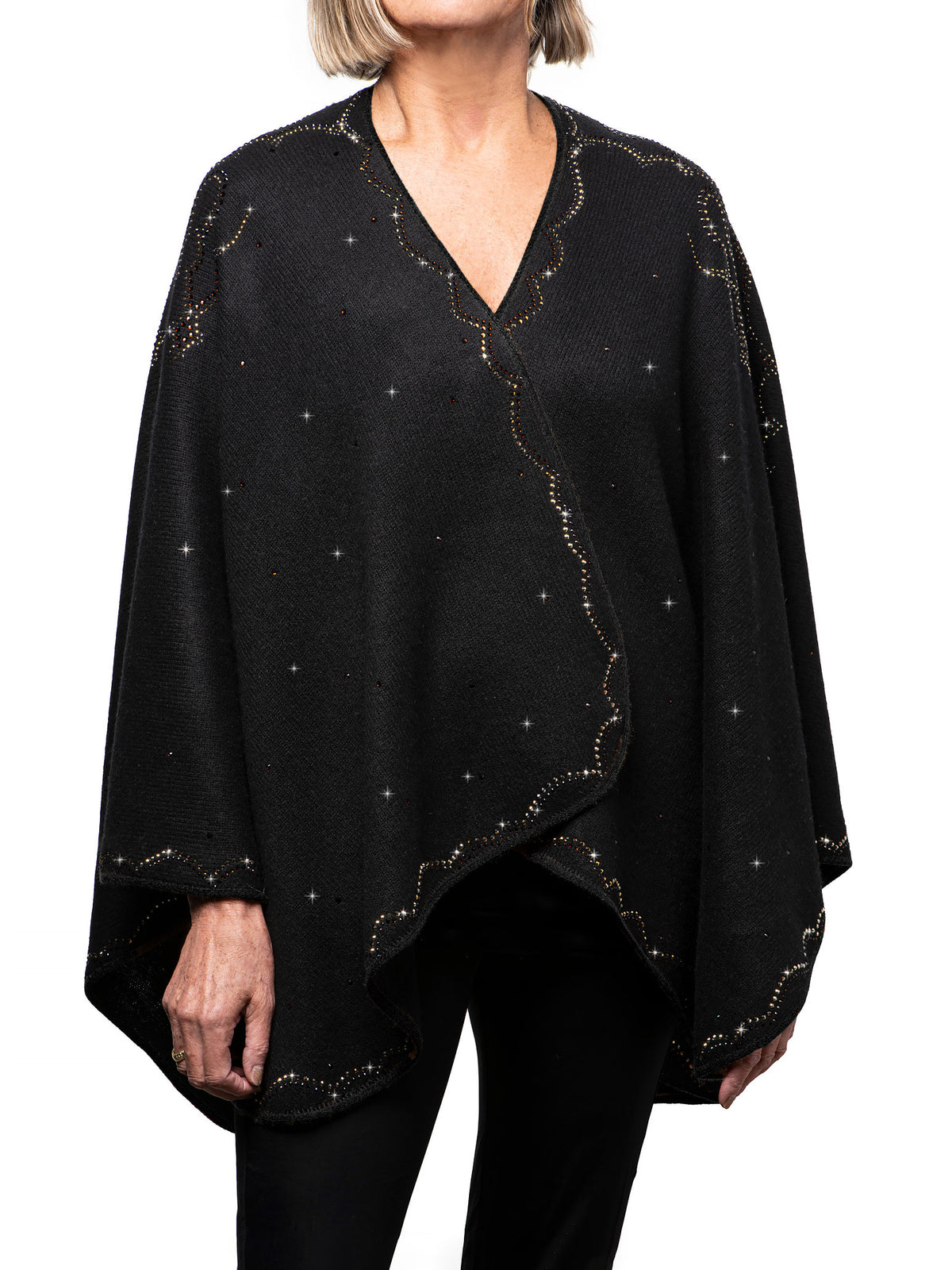 Elyse Allen's cashmere Cropped Western Cape with crystal embellishments along the edges worn by a person on a white background.