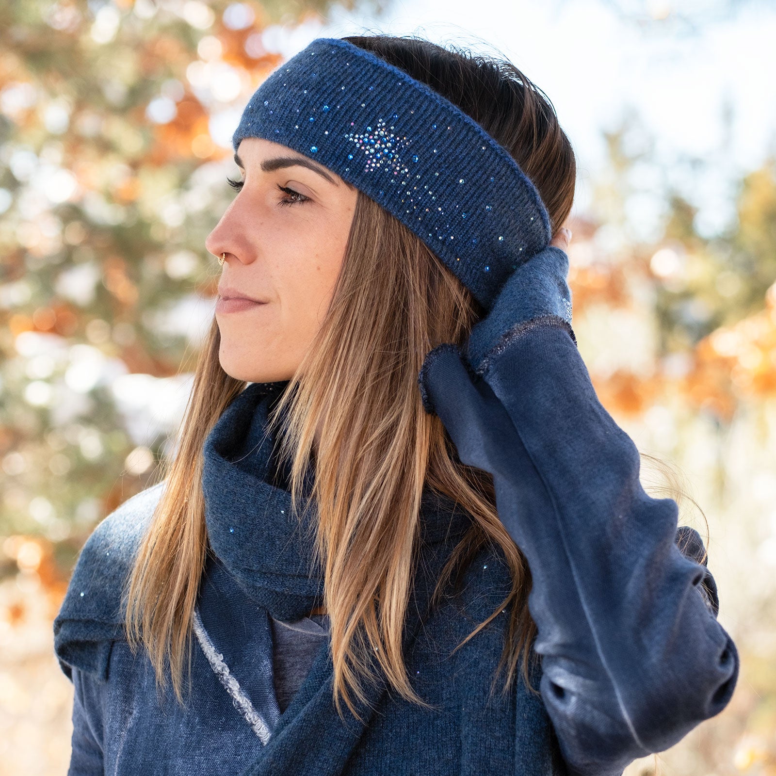 Model wearing a Lapis Blue cashmere Shooting Star Headband. editorial-image