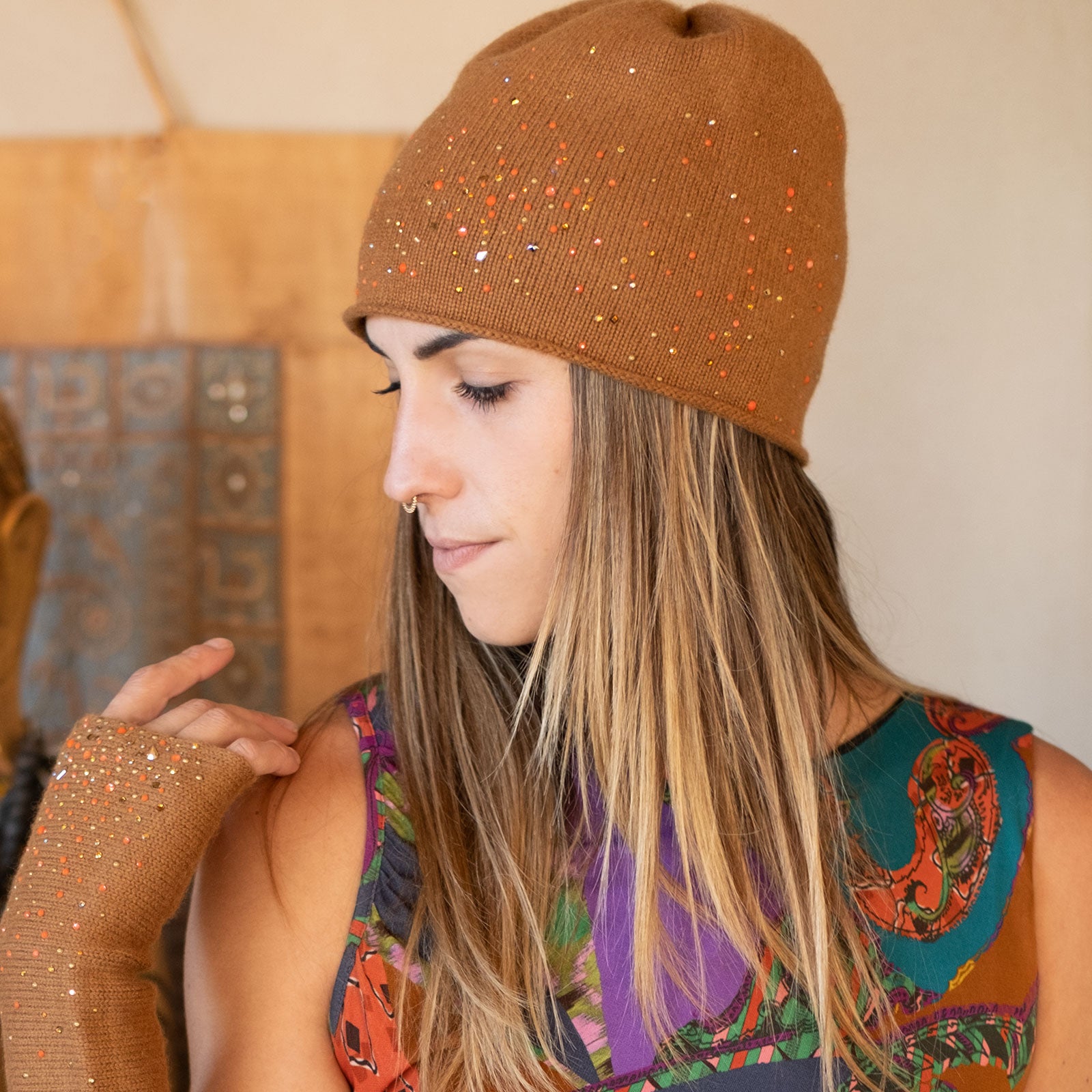 Model wearing a Chestnut Starry Night cloche by Elyse Allen Textiles. editorial-image