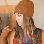 Model wearing a Chestnut Starry Night cloche by Elyse Allen Textiles. editorial-image