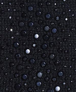 Black Merino Mid Length Dragon Gloves fabric swatch.