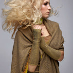 Model wearing Ochre colored Elbow Length Dragon Gloves. editorial-image