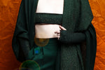 Forest Green colored editorial-image for Elbow Featherweight Gloves by Elyse Allen Textiles.