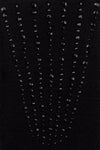 Black Epaulette fabric swatch detail.
