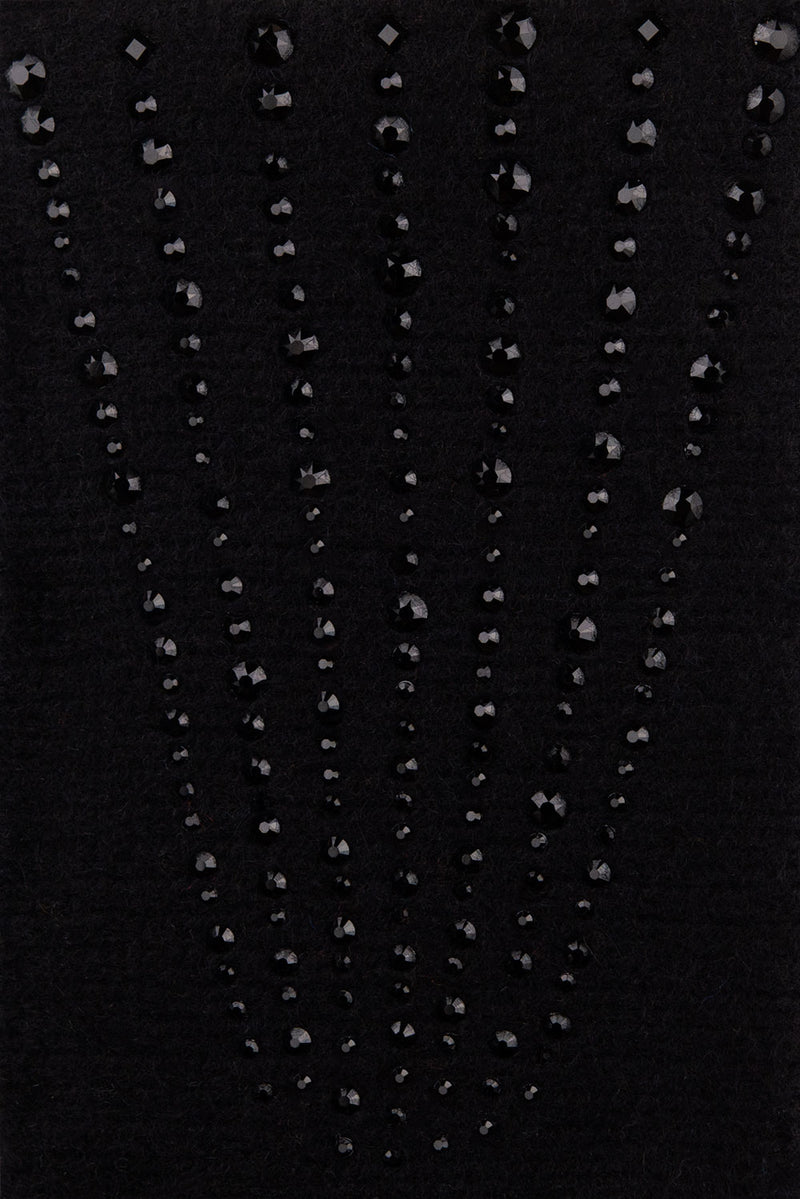Black Epaulette fabric swatch detail.