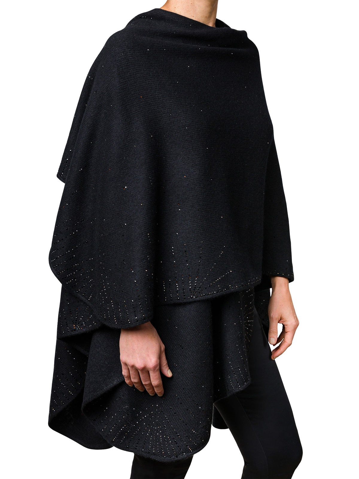 Side view of model wearing a black Heavy Weight cashmere and crystal embellished Ruana cape. Luxury wear by Elyse Allen Textiles.