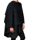 Side view of model wearing a black Heavy Weight Ruana.