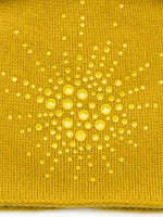 Turmeric colored Sea Urchin Cloche fabric swatch.