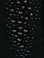 Black Mid Length Stingray Gloves fabric swatch.