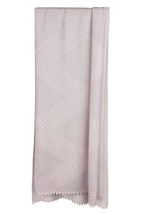 Pale pink cashmere shawl embellished with thousands of silver metal studs in a geometric pattern. Handmade by Elyse Allen Textiles.